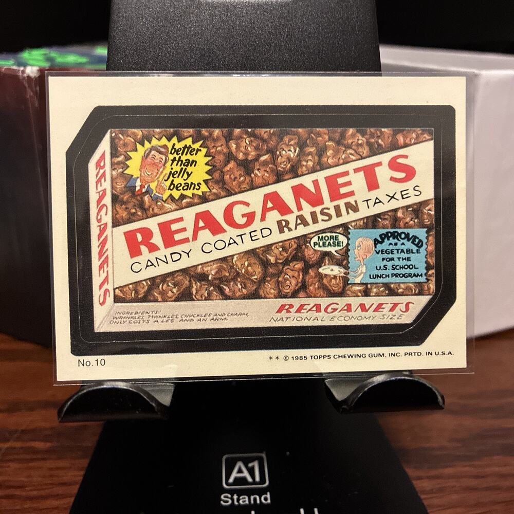 1985 Topps Wacky Packages #10 Reaganets PK26 Candy Coated Raisin Taxes ￼